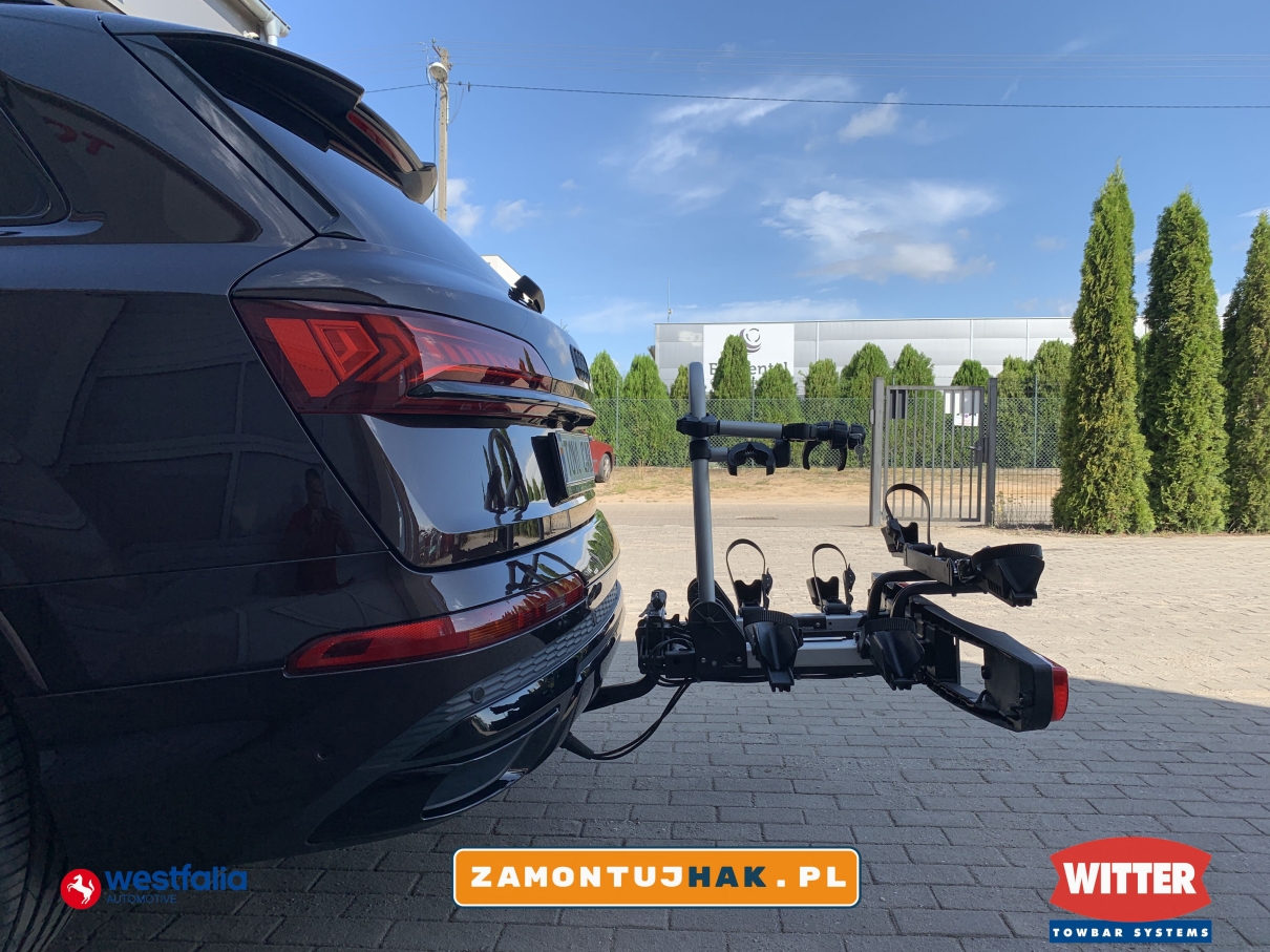 bagazniki rowerowe westfalia poznan zdjecie nowego audi q7 z bagaznikiem rowerowym na tle warsztatu samochodowego